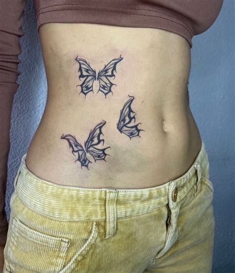 tatuaje en el abdomen|tatuajes de mujeres.